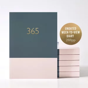 Get organised with this 365 planner. Dark grey a third of the top on the cover and a dusky pink on the bottom third. Gold foil writing "365"
