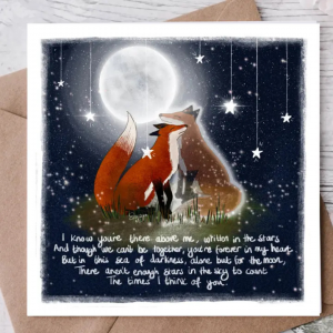 In the stars greeting card showing 2 foxes facing each other with the moon in the background