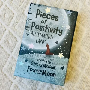Affirmation cards box. Pieces of positivity A fox looking up to a huge moon with stars all around