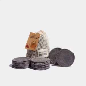 Eco reusable cotton Grey circular pads stacked around a mesh wash bag.