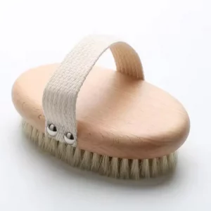 Beautiful natural bamboo body brush with canvas strap for easy use.
